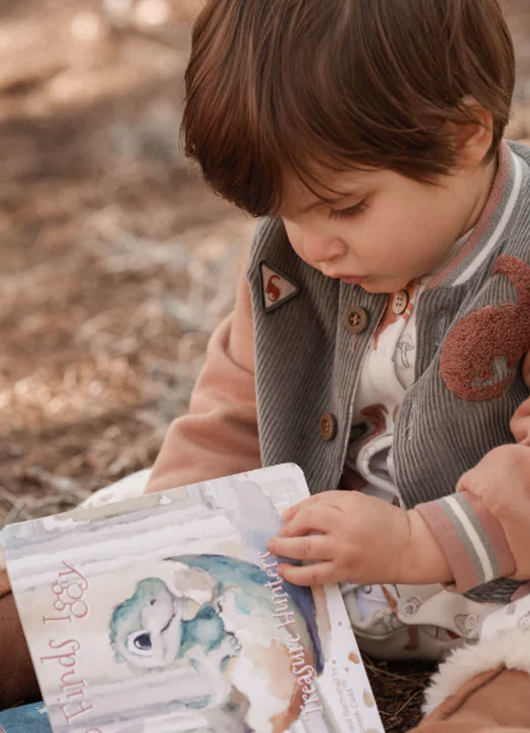 Elegant Baby Arlo Finds Iggy Dinosaur Board Book